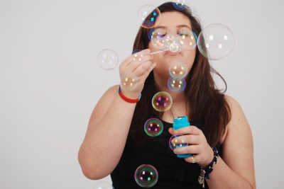 Girl Blowing Bubbles